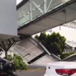 Se desprende techumbre de puente peatonal en la Terminal 1 del AICM; una automovilista resulta lesionada